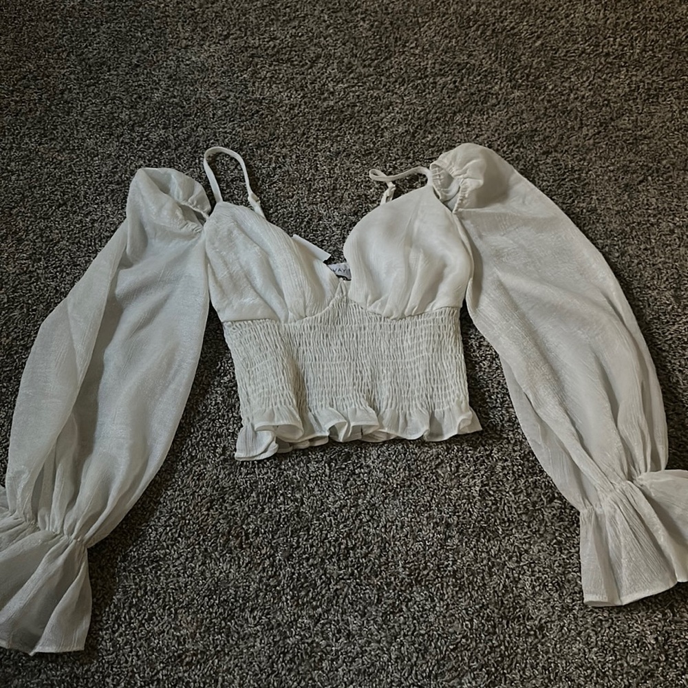 White blouse, extremely pretty sheer white, size small.